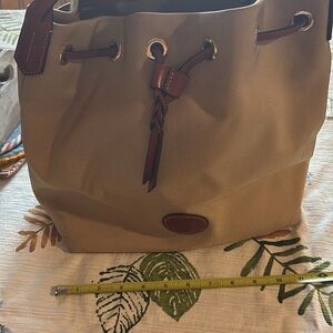Dooney and Bourke Tan Leather Trim drawstring bag
